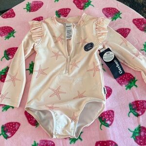 Carter's Light Pink Starfish Rashguard swimsuit SZ 24M
Zip Front Ruffle Sleeves